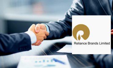 RIL subsidiary acquires Rhea, stock near all-time high