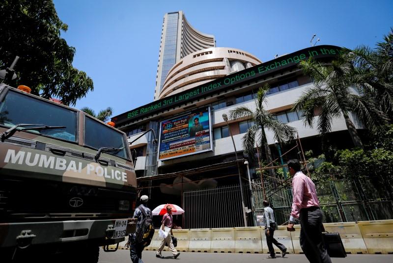 Sensex and Nifty at fresh highs